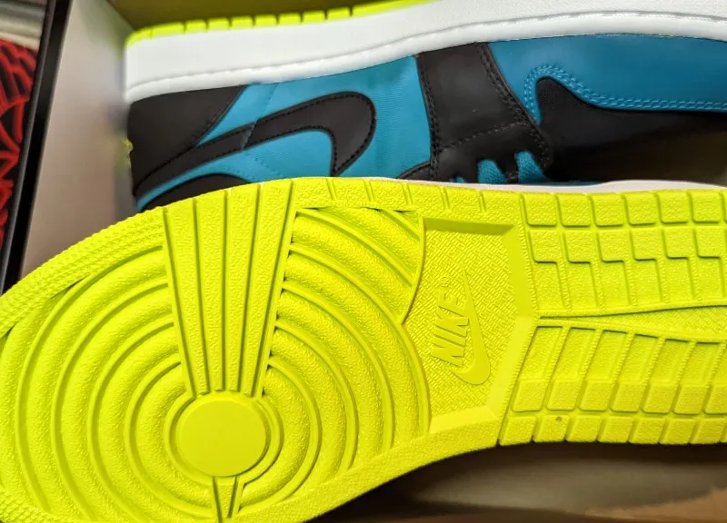 Air Jordan 1 Low sneakers in lush teal, venom green, and black