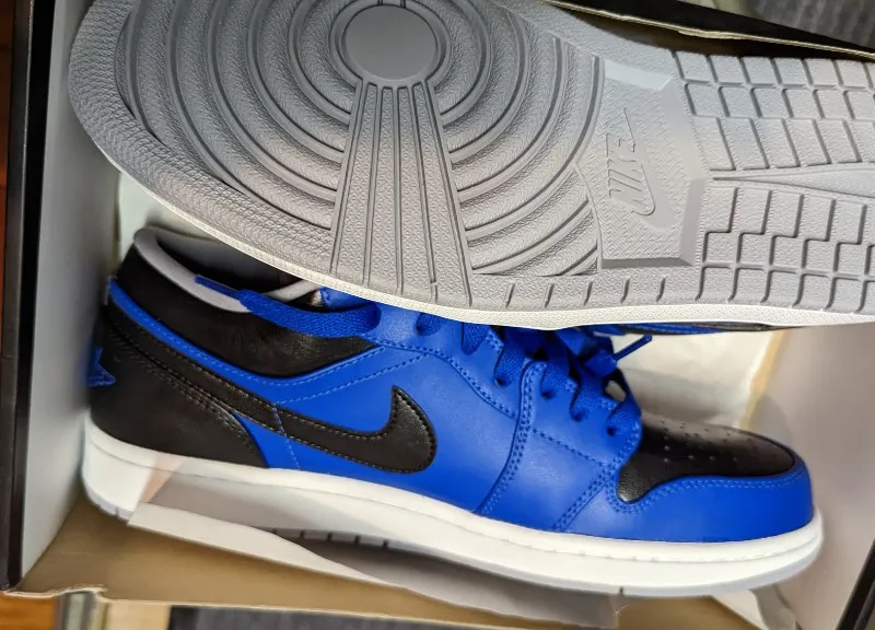 Air Jordan 1 Low sneakers in sport blue, wolf grey, and black