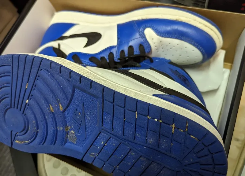 Air Jordan 1 Mid Game Royal sneakers in white, black, and game royal