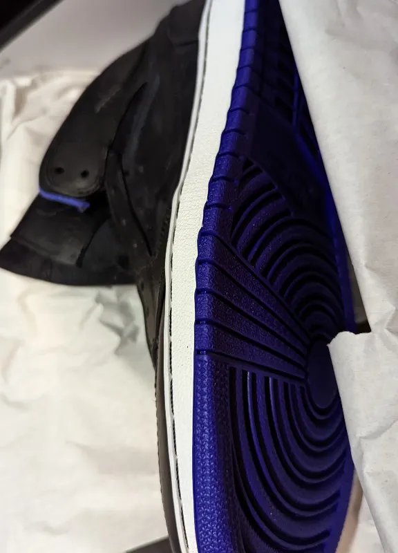 Air Jordan 1 Mid Nouveau sneakers in black, dark concord, and white