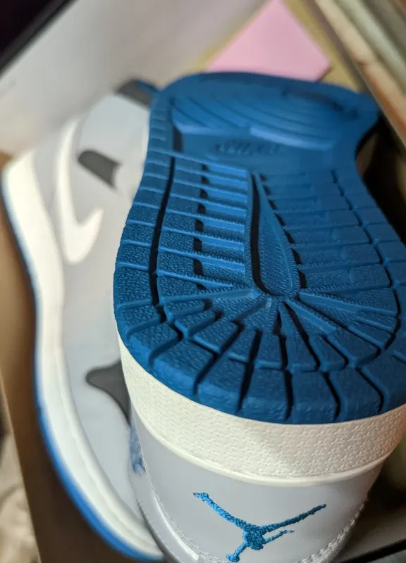 Air Jordan 1 Mid sneakers in wolf grey, tropical teal, dark grey, and white