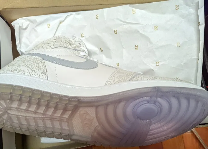 Air Jordan 1 Retro Hi OG Laser sneakers in white and metallic silver