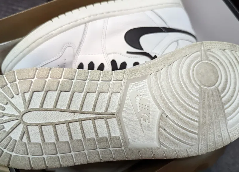 Air Jordan 1 Retro High OG Yin Yang sneakers in white and black