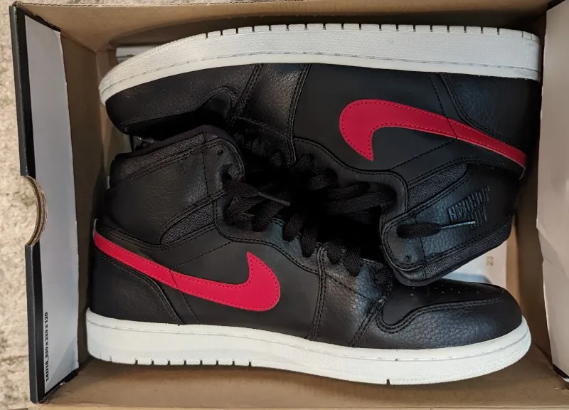Air Jordan 1 Retro High sneakers in black, gym red, and white