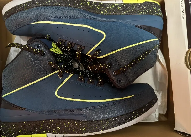 Air Jordan 2 Retro sneakers in nightshade, volt ice, black, and pure platinum