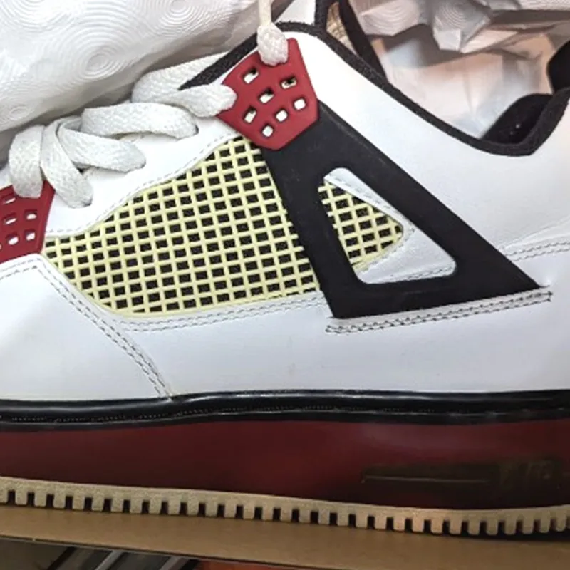 Air Jordan Force 4 sneakers in white, varsity red, and black