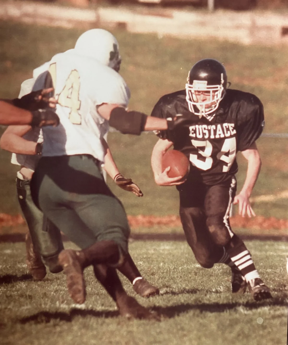 Dan Hogan running with the football in a Bishop Eustace Prep game