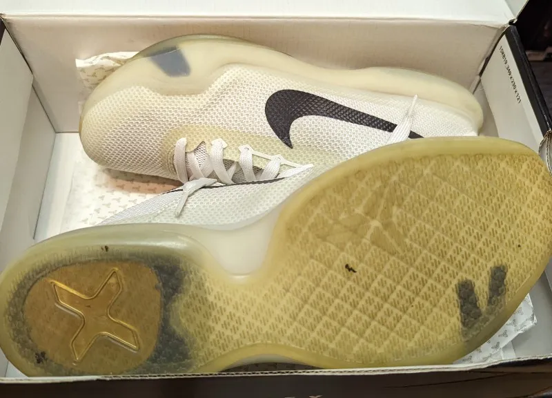Nike Kobe 10 Fundamentals sneakers in white, black, and wolf grey