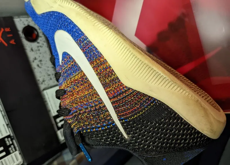Nike Kobe 11 Elite Low Black History Month sneakers in multi-color, black, and white